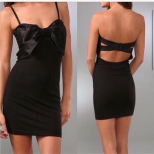 Elizabeth and James size xs black bodycon bow dress with removable straps.